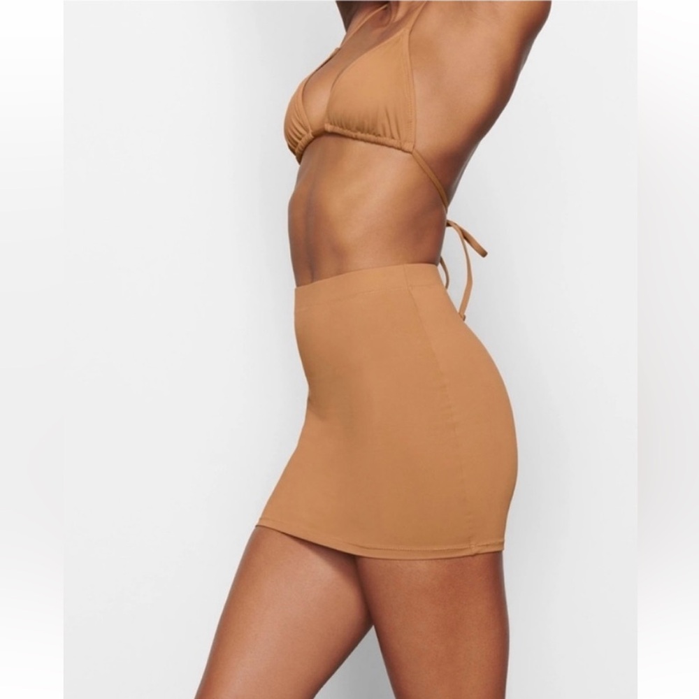 SKIMS MINI TUBE SWIM SKIRT COVERUP IN COLOR ALMOND